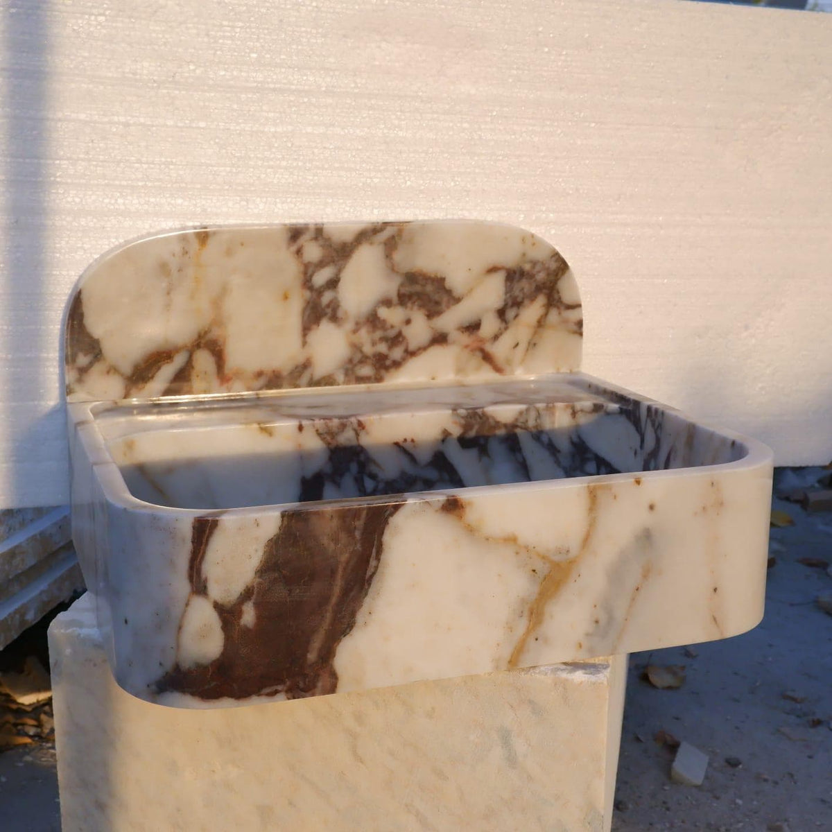 Hand-Carved Calacatta Viola Marble Wall Sink